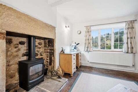 Snug - fireplace and window.jpg