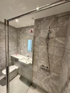 Fully tiled bathroom suite