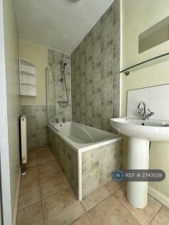 Bathroom Has Instant Hot Water 'Over Bath' Shower