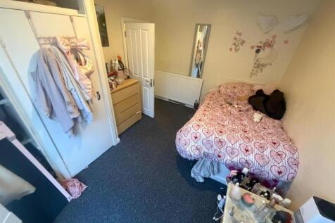 Cozy double bedroom with ample storage space....