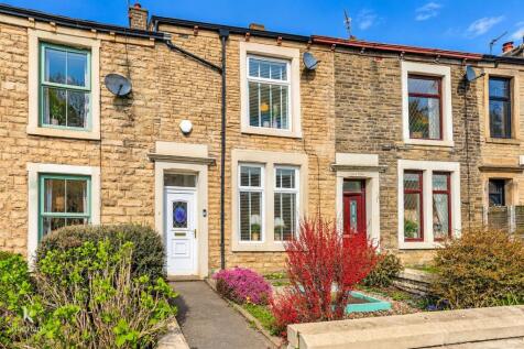 Sunlit British Stone Terrace Row.jpg