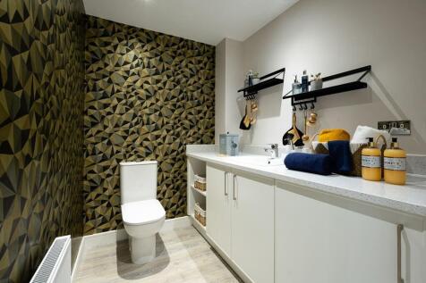 Space for laundry in the combined cloakroom utility