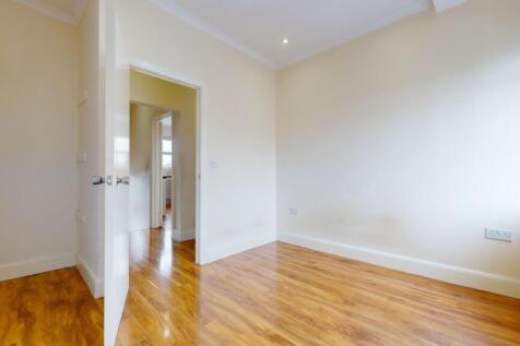 Bright, well-presented bedroom with polished wo...