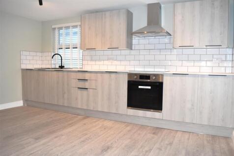 LOUNGE OPEN TO KITCHEN