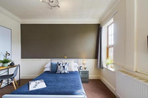 A bright and inviting double bedroom, perfect f...
