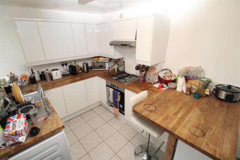 Modern kitchen with stylish wooden worktops...