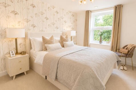 a bedroom with a large bed