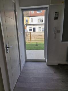 Bright hallway with view to a private garden...
