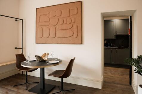 Stylish eat-in kitchen nook with modern seating...