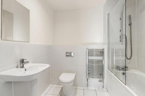Step into this elegantly designed bathroom that offers both style and functionality.