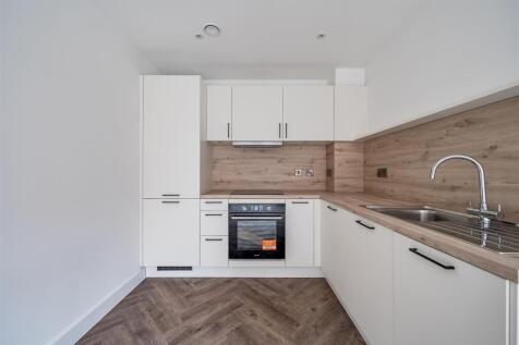 Modern kitchen with elegant wood finishes...