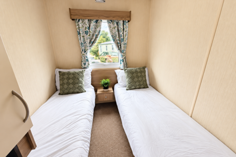 Bright Twin Bedroom Featuring Two Single Beds, Sof