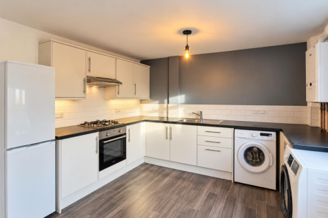 Modern Charcoal Kitchen-Laundry Interior.png