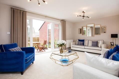 French doors from the lounge to the rear garden bring the outside in