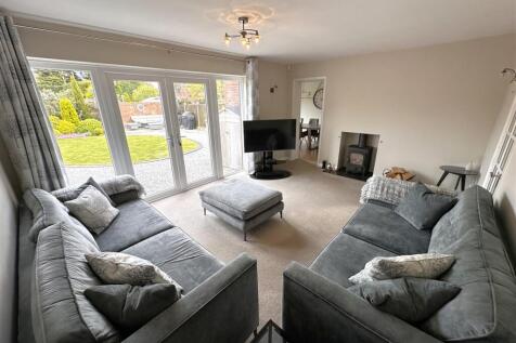 Generous Living Room With French Doors 220
