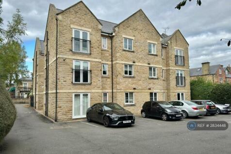 Rear Of f Block Showing Parking Area.