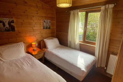 Twin bedroom in lodge at Watermouth Lodges Ilfraco