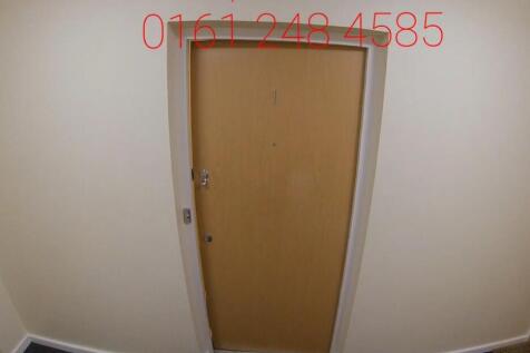 Well-maintained internal hallway with a secure ...