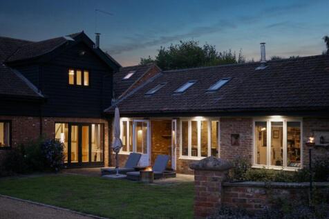 Sunroom and Patio at dusk