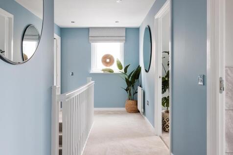 The landing is flooded with natural light