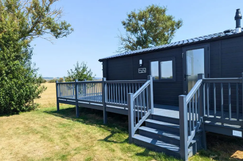 Sunrise Lodge Deluxe Exterior With Decking At Orch