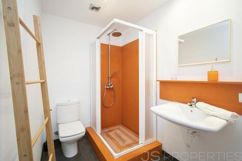 FRONTLINE DUPLEX WITH UNOBSTRUCTED VIEWS OF THE SEA AND MOUNTAINS 