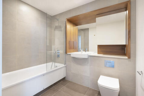 Experience luxury in this elegantly designed modern bathroom.