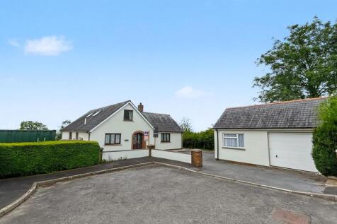 Front photo of house and garage