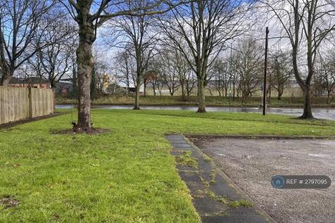 Communal Green Space And Off Road Parking