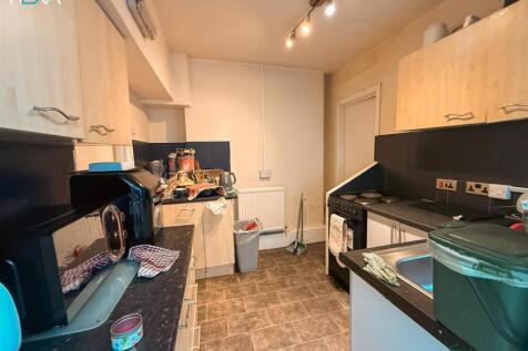 Practical kitchen with ample storage space...