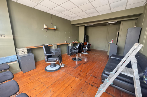 Naturally brightened barbershop interior.png