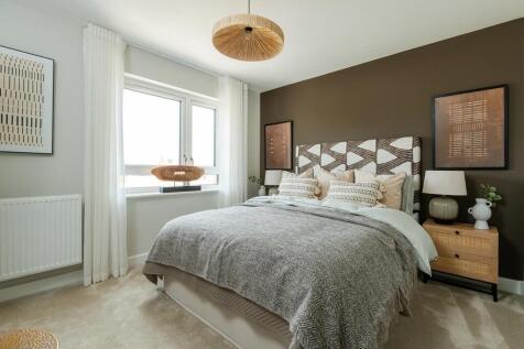 Generous main double bedroom for a comfortable and relaxing sleep