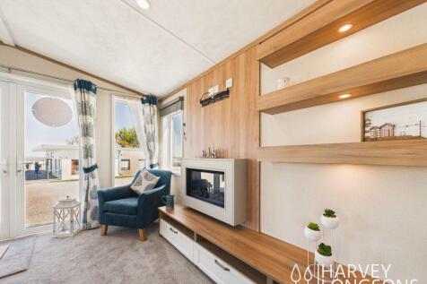 Modern caravan living room with built in fireplace