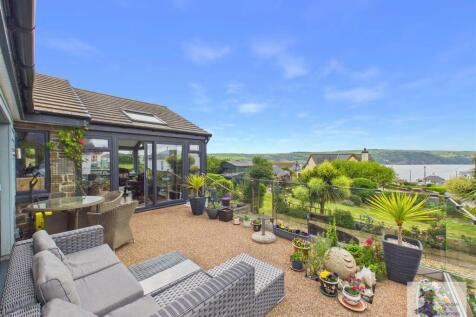 Rear patio and sea views