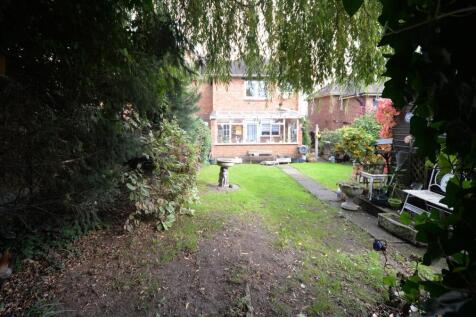 view of house from pergola.JPG
