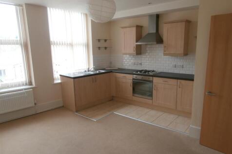 LOUNGE WITH KITCHEN AREA