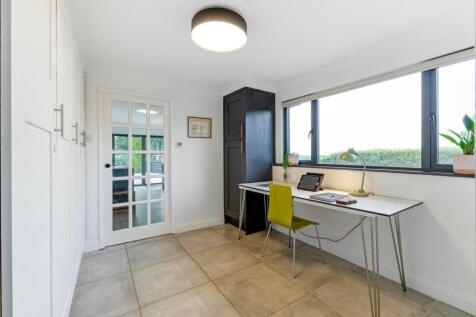 Doorway from welcome hall office into kitchen