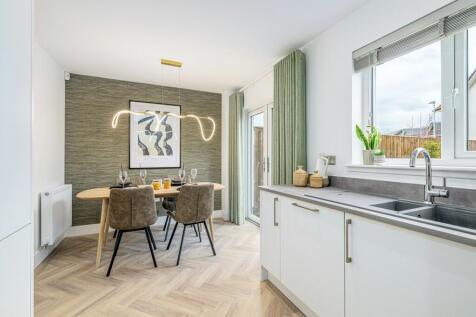 3 bedroom showhome | open plan kitchen, dining, and family area with french doors to rear garden