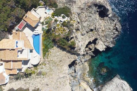 28 la mola Ibiza Flair Anwesen in unverbaubarer erster Meereslinie kaufen wald