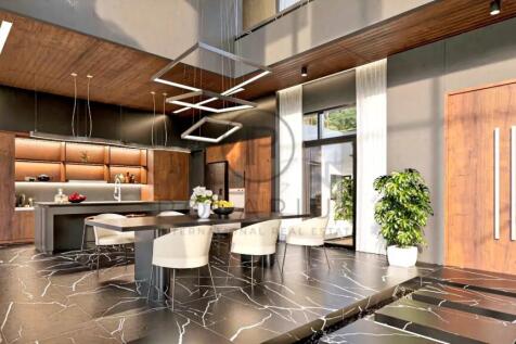 Modern kitchen and dining area with sleek wood cab