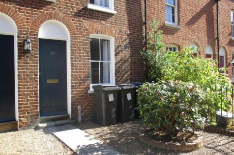 Charming brick terraced house with gravel front...