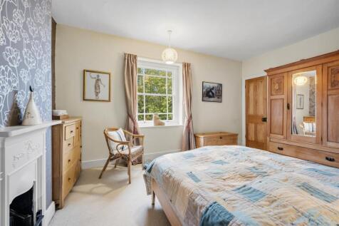 Bedroom One - fireplace and window.jpg