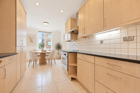 Scandinavian Galley Kitchen and Dining Nook.png