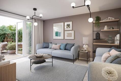 A light and airy living room featuring double doors to the garden
