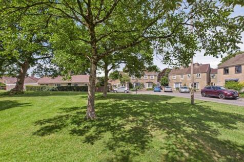 Adjacent green to house