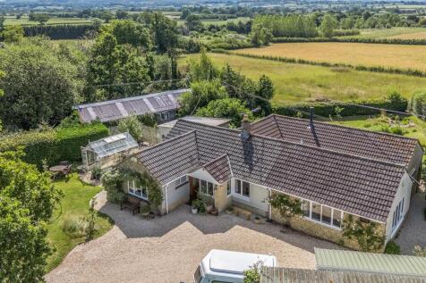 Aerial including field behind