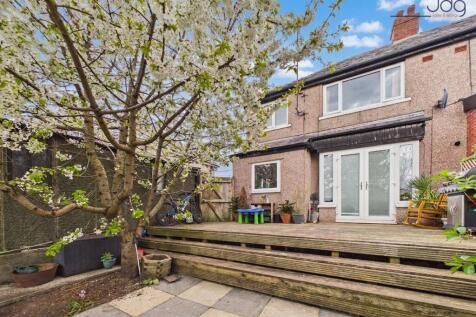Spacious Garden with mixture of lawn, flags and decking