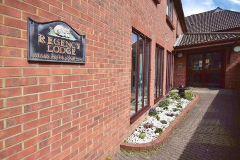 ENTRANCE TO REGENCY LODGE