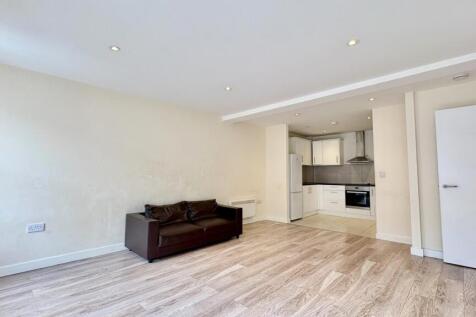 Spacious open-plan living room and kitchen...