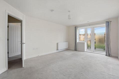 a room with a door and windows